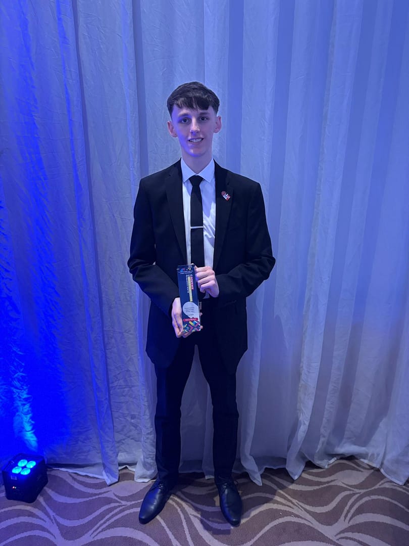 Shot of a group of businesspeople working together on a laptop